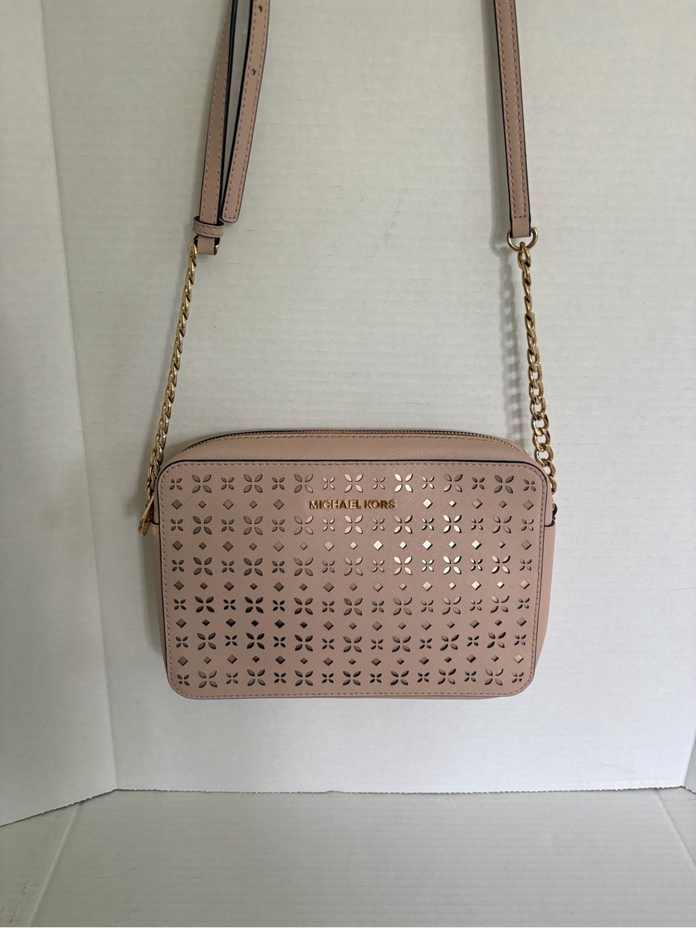 Michael Kors jet set laser cut pink with rose gold underlay Leather Crossbody